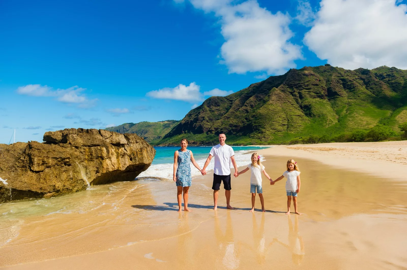 A perfect Oahu Hawaii beach family photoshoot by Oahu Hawaii Photographer Oahu Hawaii Photography