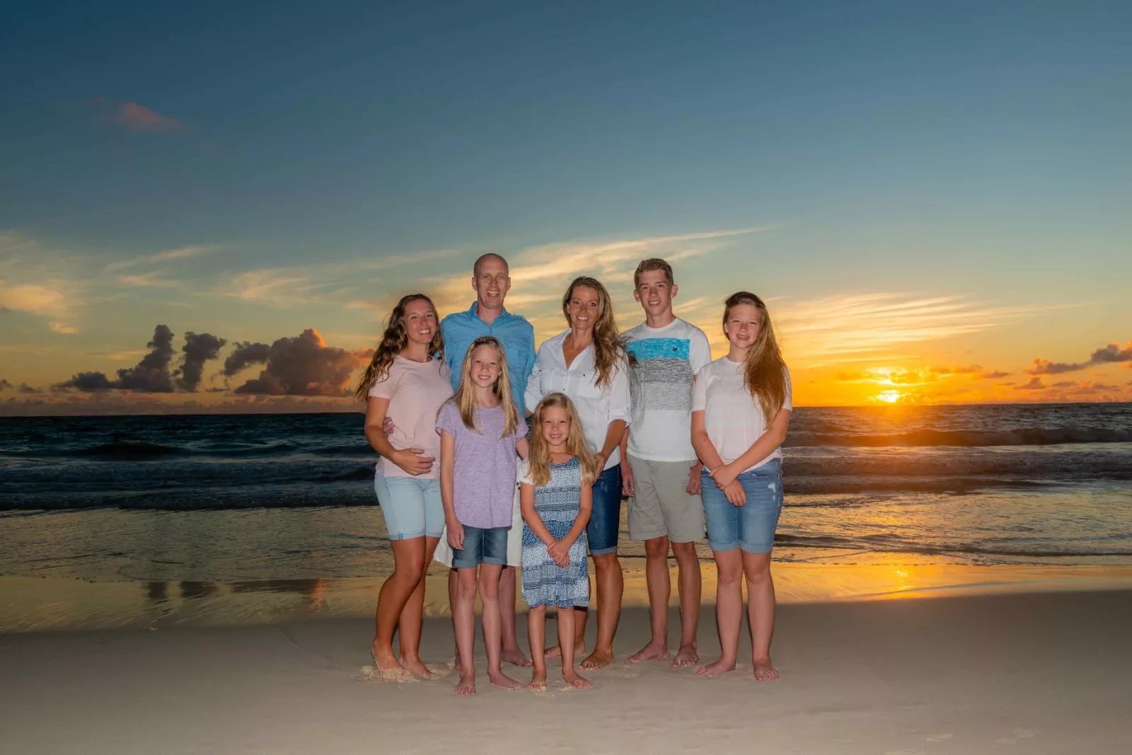 A perfect Oahu Hawaii beach family photoshoot by Oahu Hawaii Photographer