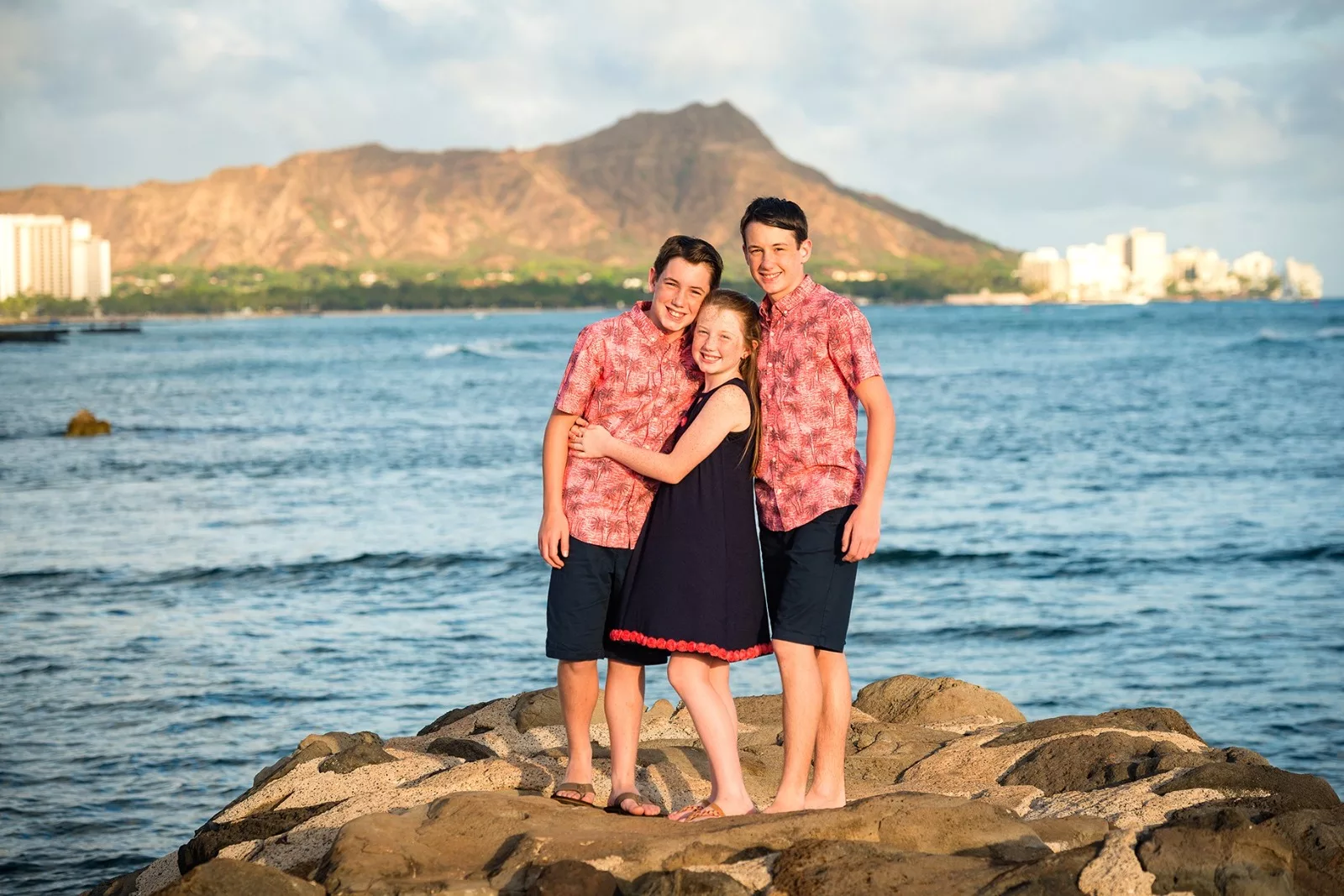 A Oahu Hawaii beach group photoshoot by Oahu Hawaii Photography Oahu Hawaii Photographer