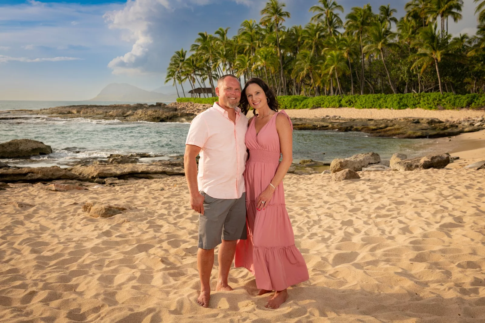 an image of a couple at the beach captured by oahu hawaii photographer