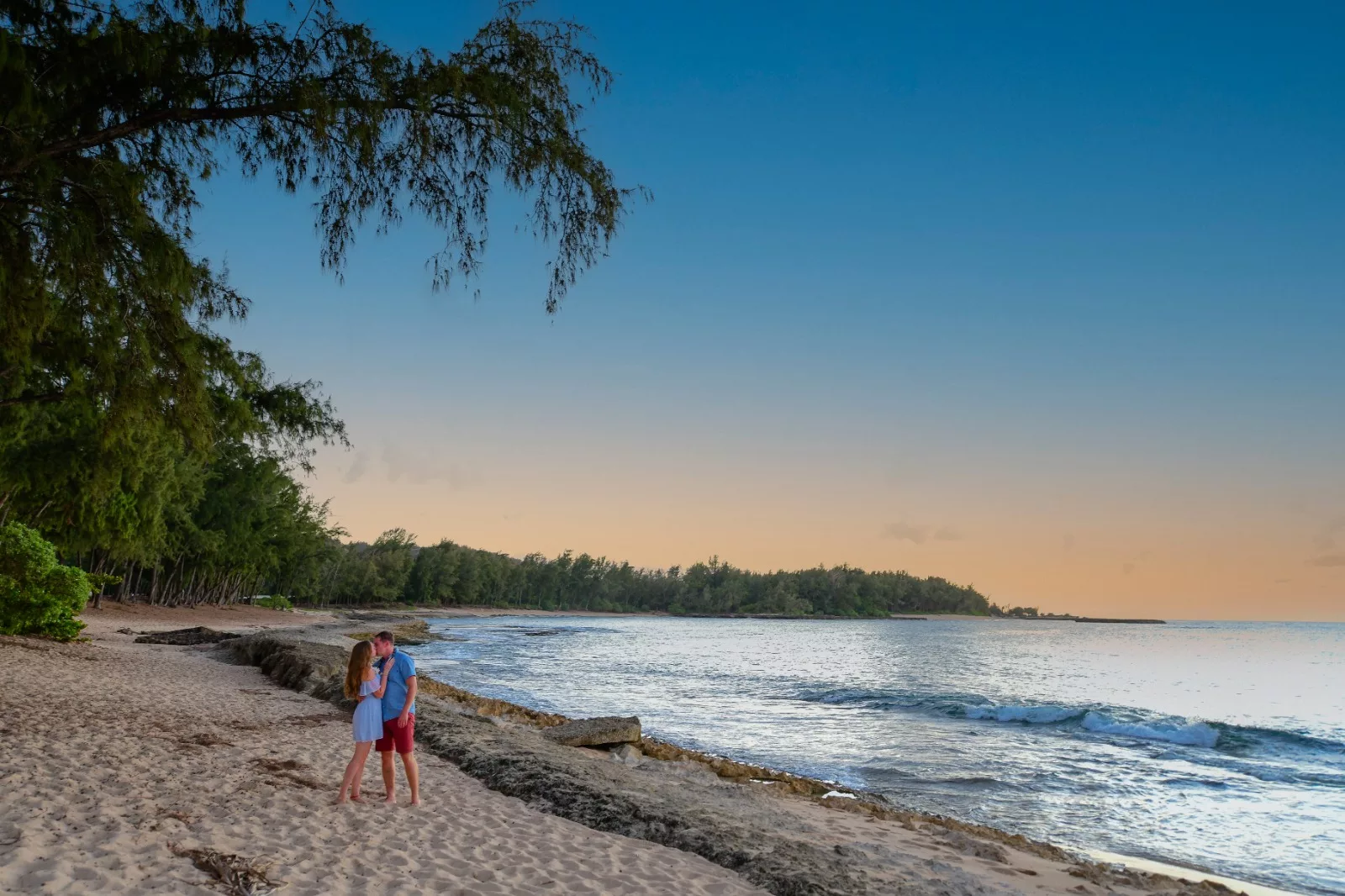 an image of a couple at north shore beach captured by north shore photographer